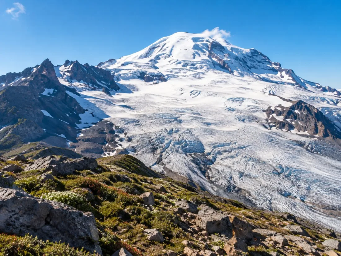 A rocky tundra ridge above Sunrise facing the Emmons Glacier